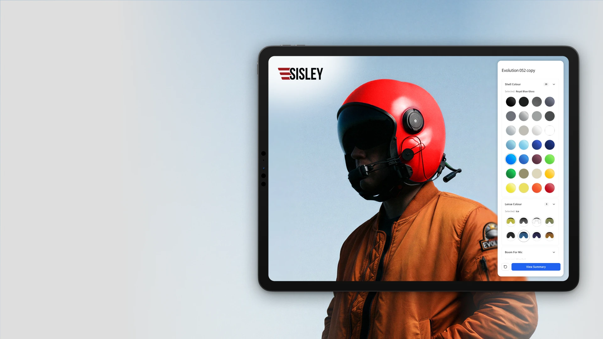 A red Evolution flight helmet with shell colour and lens options on a tablet